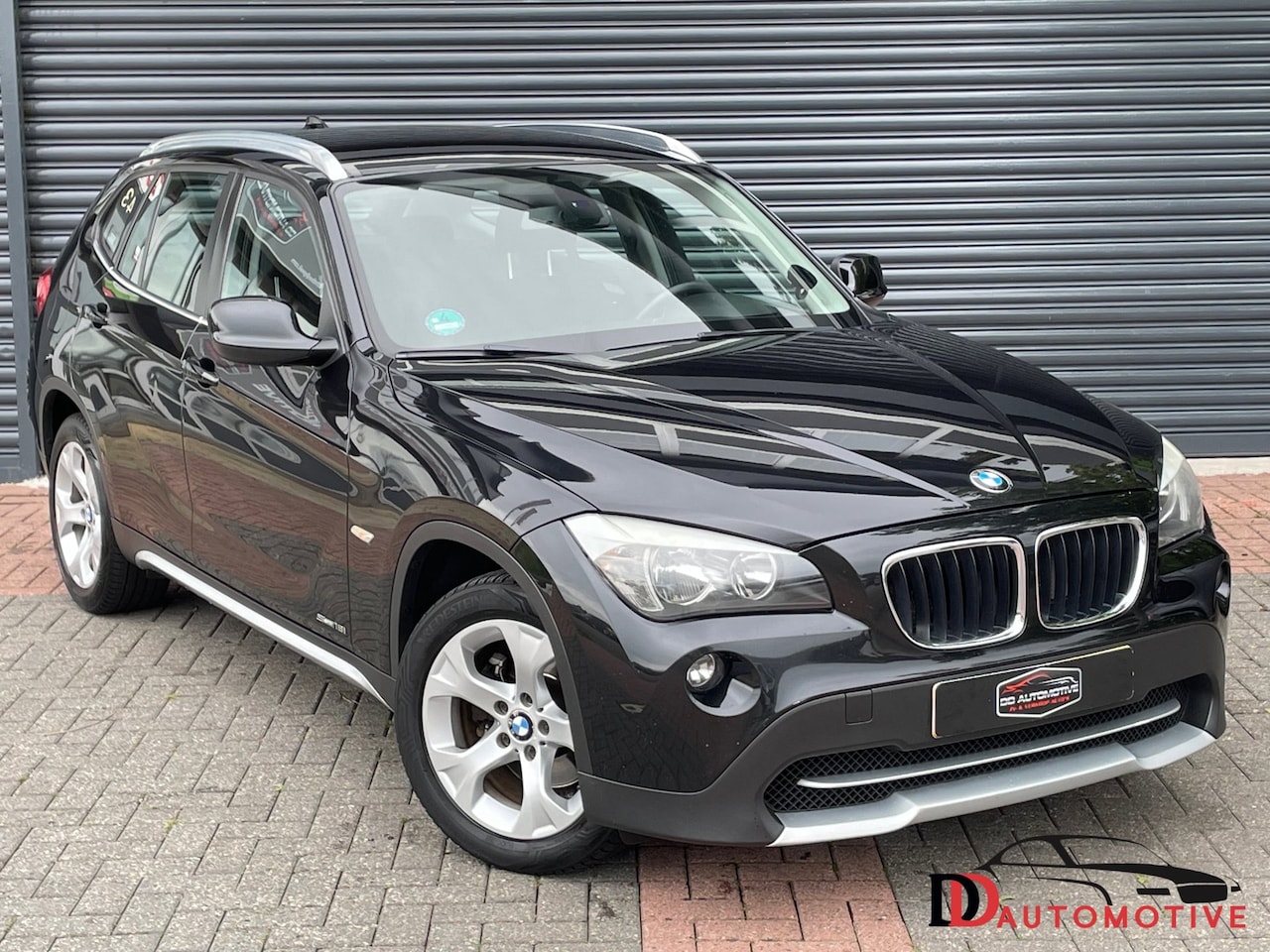 BMW X1 - SDrive18i Executive Navi | Trekhaak | Climate Control | Pdc - AutoWereld.nl