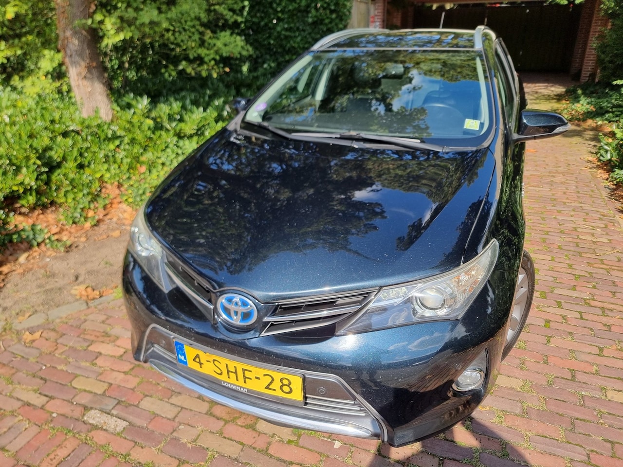 Toyota Auris Touring Sports - 1.8 Hybrid Executive Pano/Leer/Navi/JBL - AutoWereld.nl