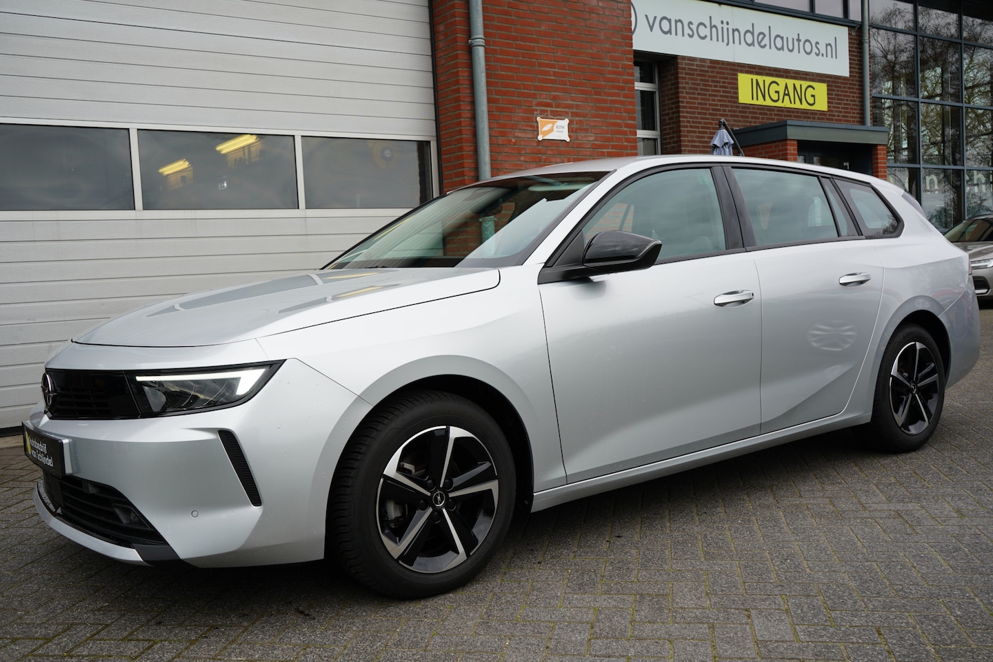 Opel Astra Sports Tourer - 1.2 TURBO EDITION SPORT APRIL 2024 KEURIGE NETTE STAAT NAVIGATIE ANDROID/APPLECARPLAY ADAP - AutoWereld.nl