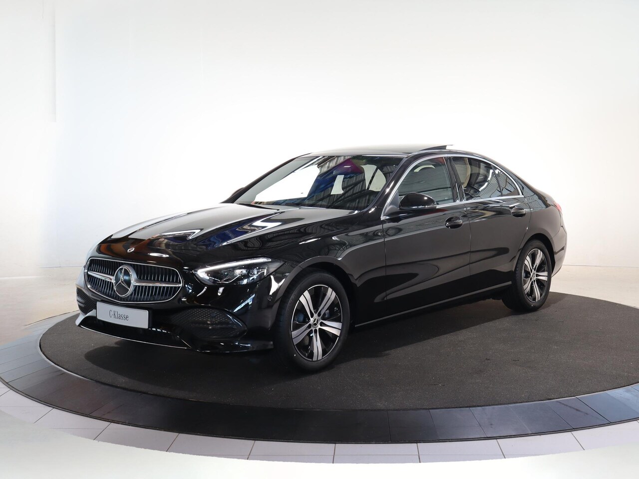 Mercedes-Benz C-klasse - 180 Business Solution | Panoramaschuifdak | Trekhaak | Achteruitrijcamera | Verwarmde stoe - AutoWereld.nl
