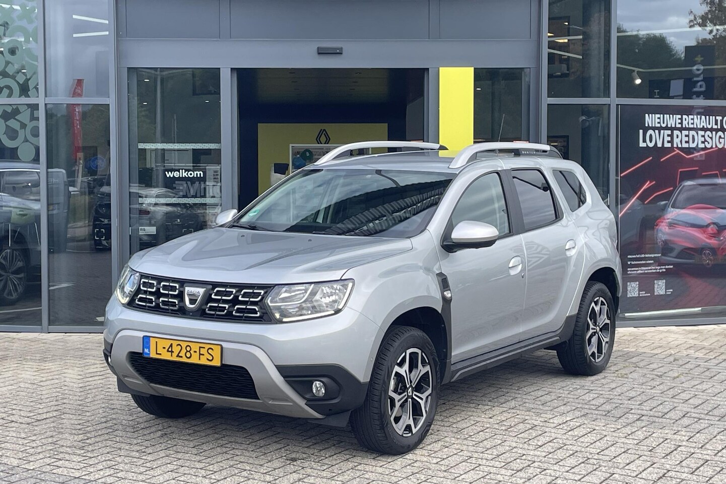 Dacia Duster - TCe 100Pk Bi-Fuel Comfort | Trekhaak | Around view camera | Navigatie | Apple carplay/andr - AutoWereld.nl
