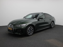BMW i4 - eDrive40 High Executive 84 kWh M-PAKKET | STOEL KOELING EN VERWARMING | PANORAMADAK | ADEP