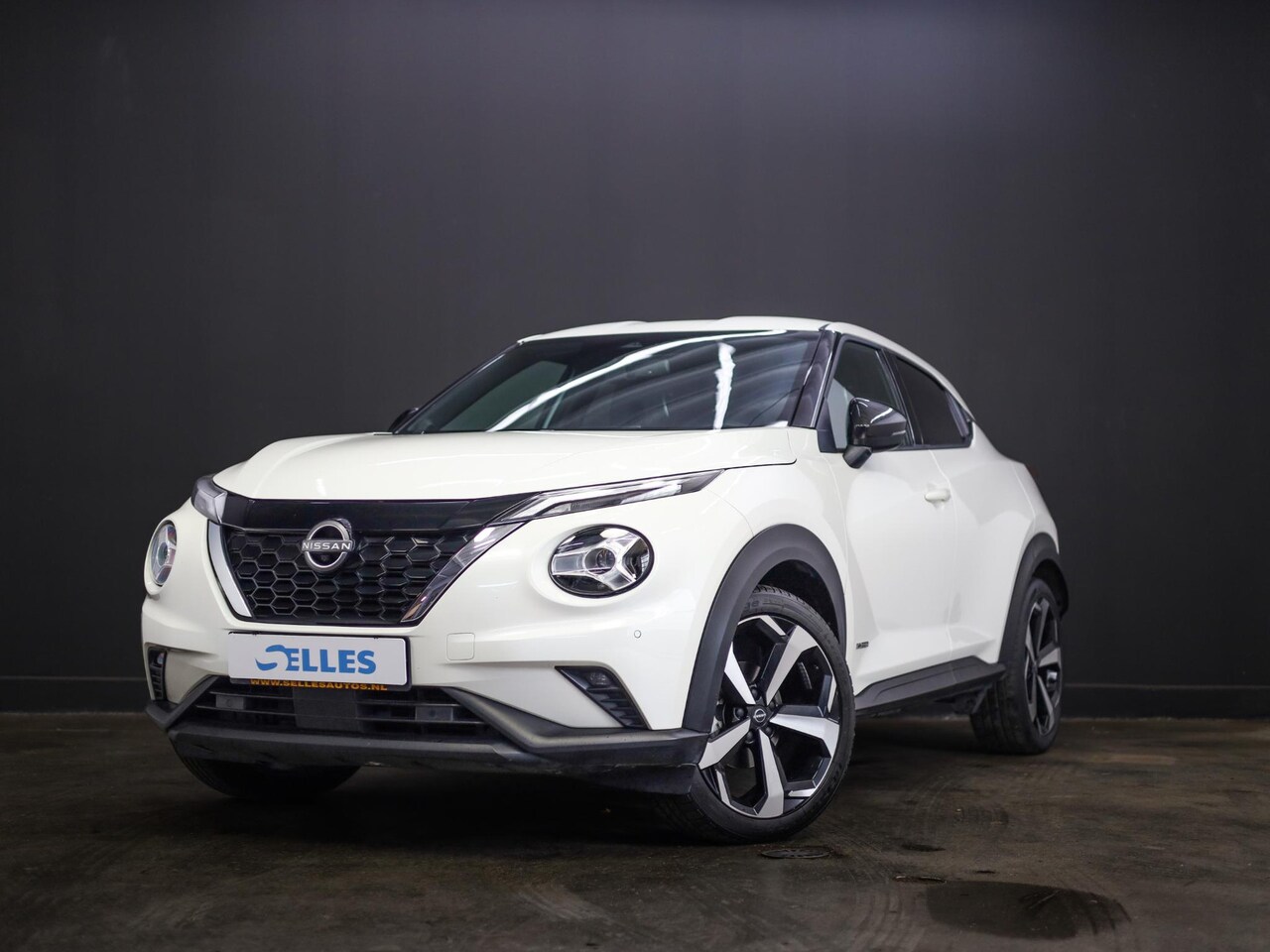 Nissan Juke - 1.6 Hybrid Business Premium Tekna | Bose Audio | Parelmoer lak | Stuur en Stoelverwarming - AutoWereld.nl
