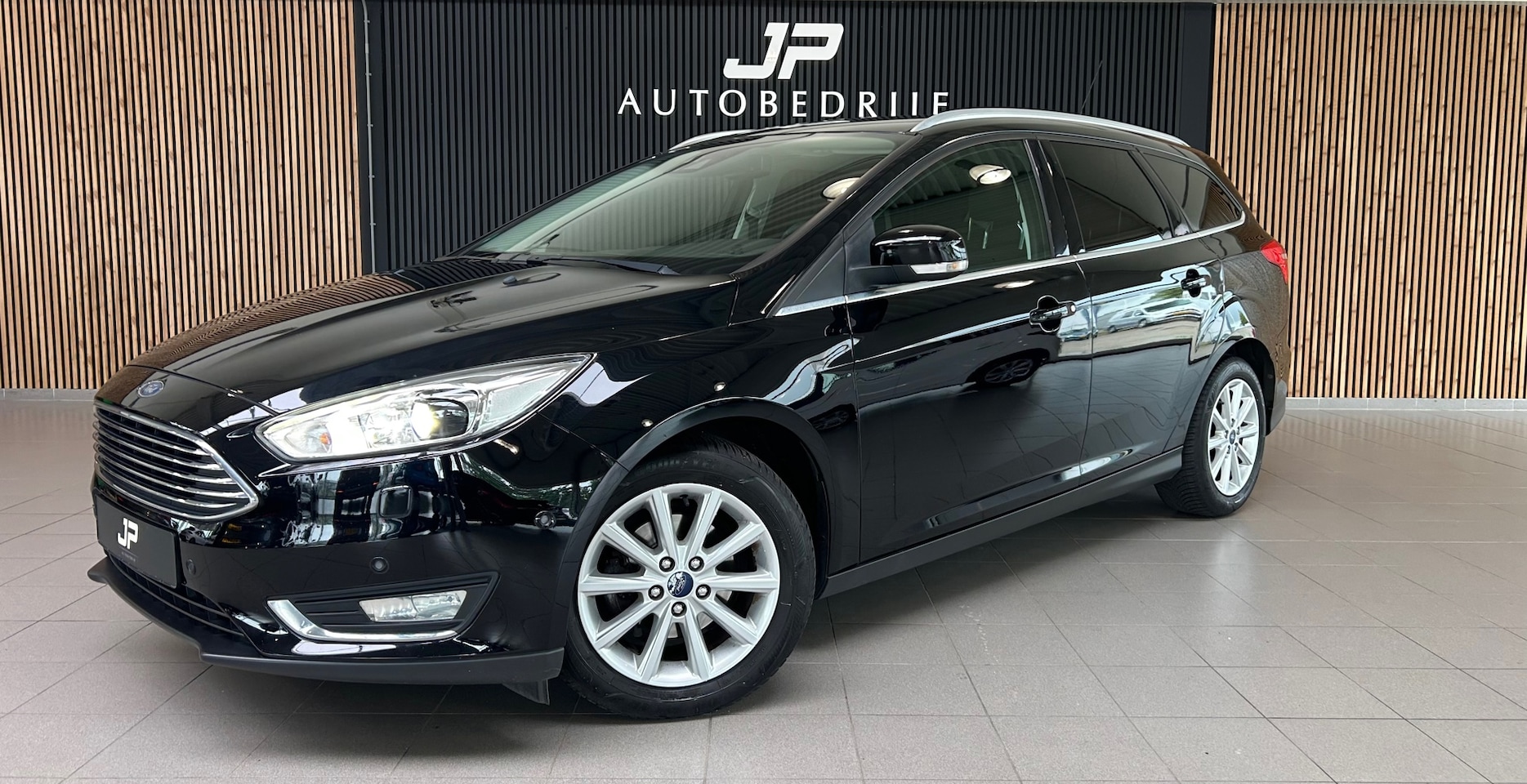 Ford Focus Wagon - 1.0 Titanium Edition CRUISE|NAVI|STOEL & STUURVERWARMING|PDC| - AutoWereld.nl