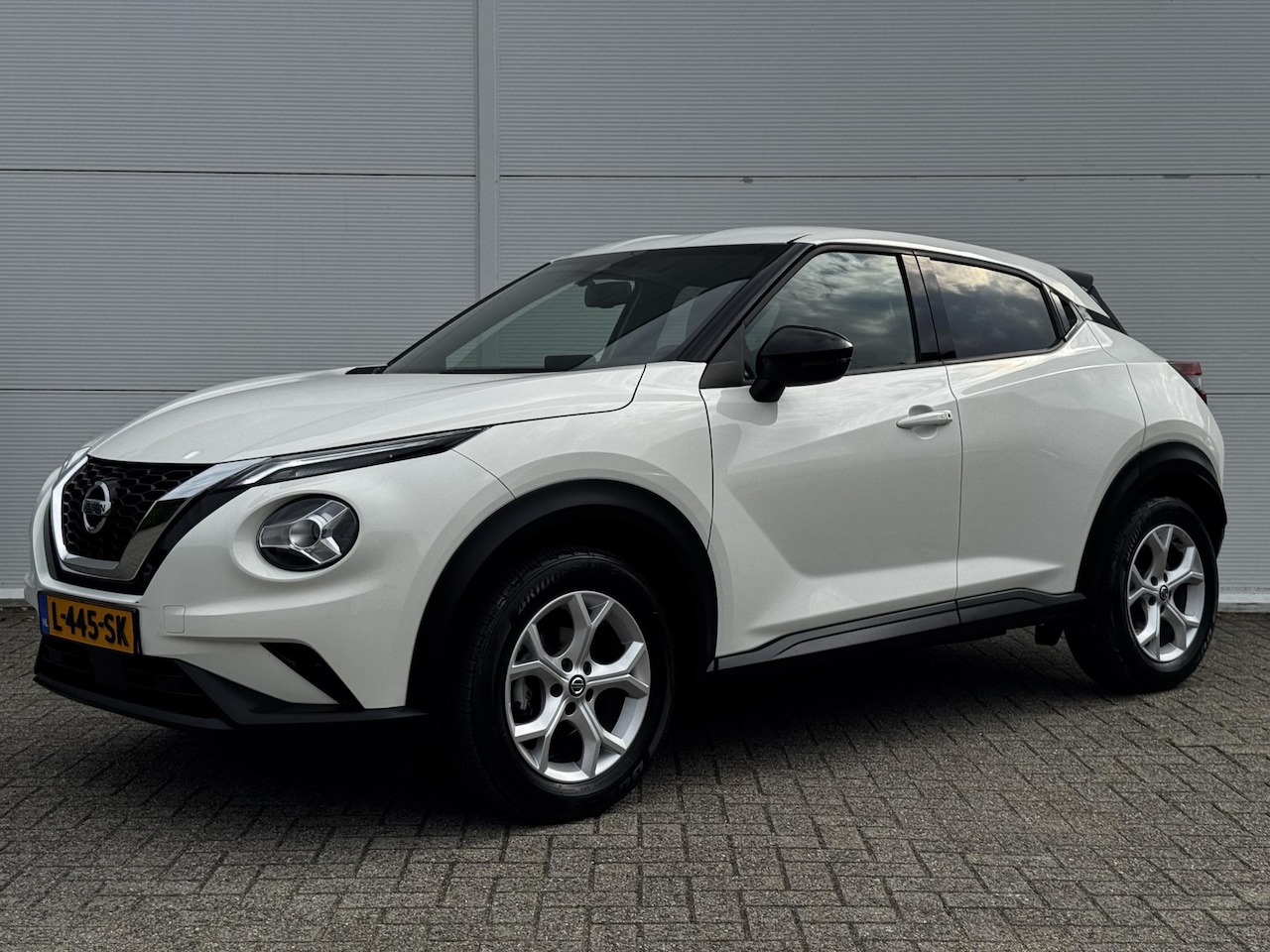 Nissan Juke - 1.0 DIG-T N-Connecta / Navigatie via Apple Carplay of Android Auto / Achteruitrijcamera / - AutoWereld.nl