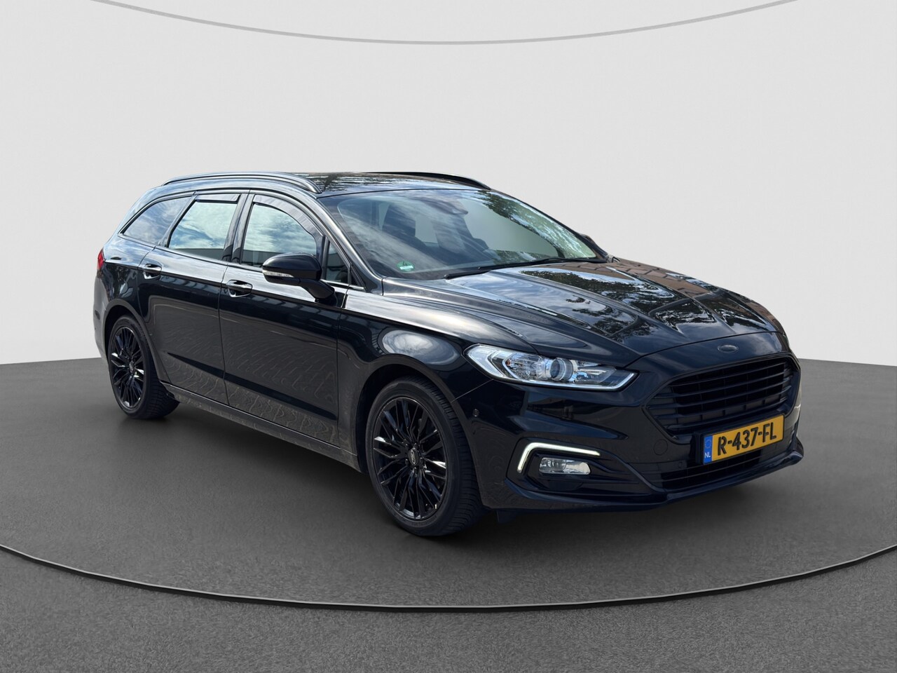 Ford Mondeo Wagon - 2.0 IVCT HEV Titanium | Black edition | Camera | Adaptive Cruise - AutoWereld.nl