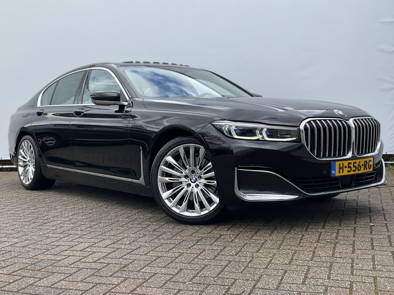 BMW 7-serie - 730d xDrive ACC Pano Softclose 4wielsturing High Executive HUD - AutoWereld.nl