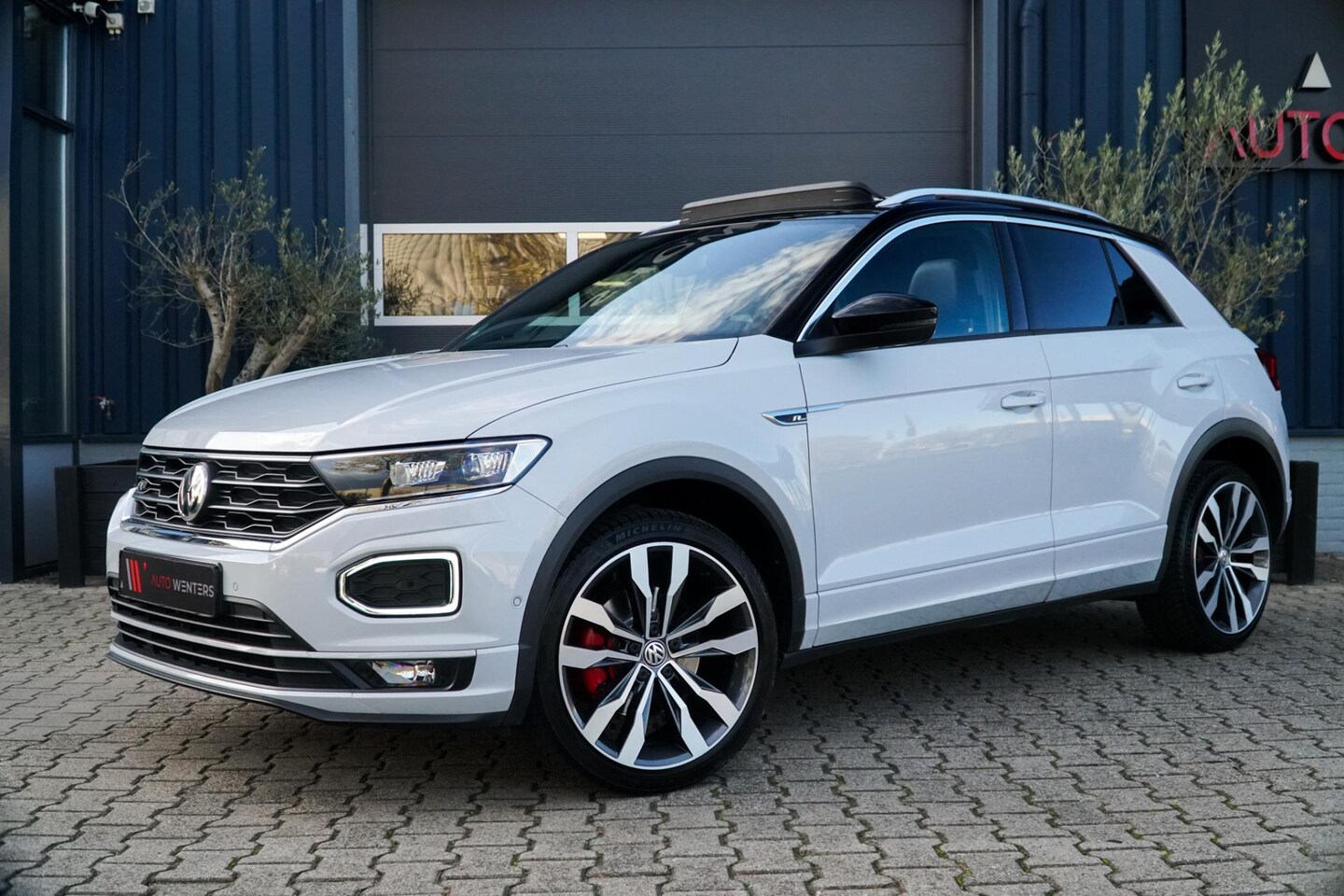 Volkswagen T-Roc - 2.0 TSI 4Motion Sport Business R 190PK! PANO|BEATS|TREKHAAK - AutoWereld.nl