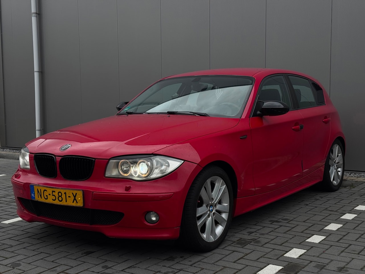 BMW 1-serie - 120i High Executive | Automaat | APK 22-10-2027 | Parkeersensoren | Xenon | Climate contro - AutoWereld.nl