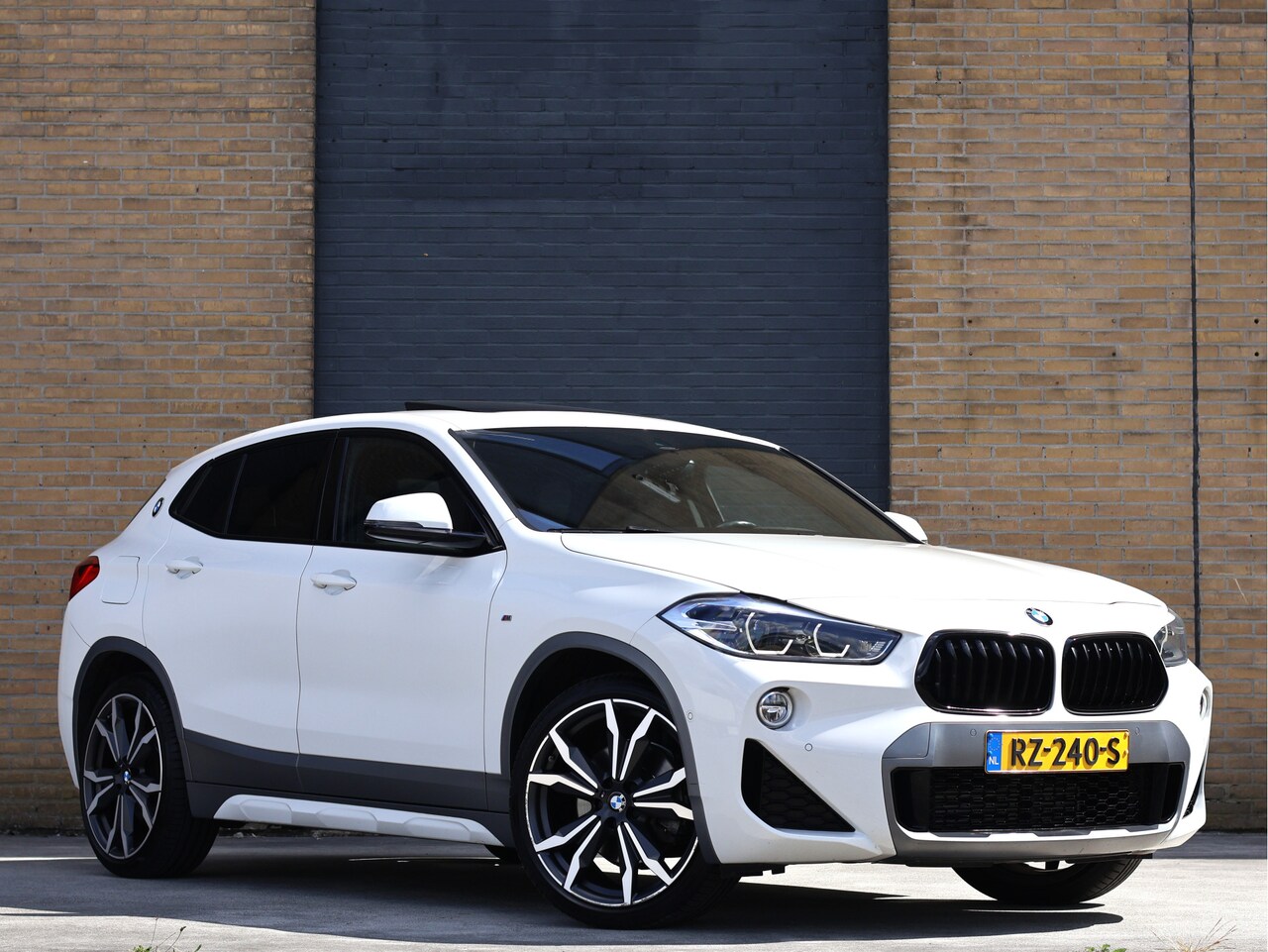 BMW X2 - sDrive20i M Sport X Pano | HUD | 20" M | Trekhaak | NL Auto | Leder - AutoWereld.nl