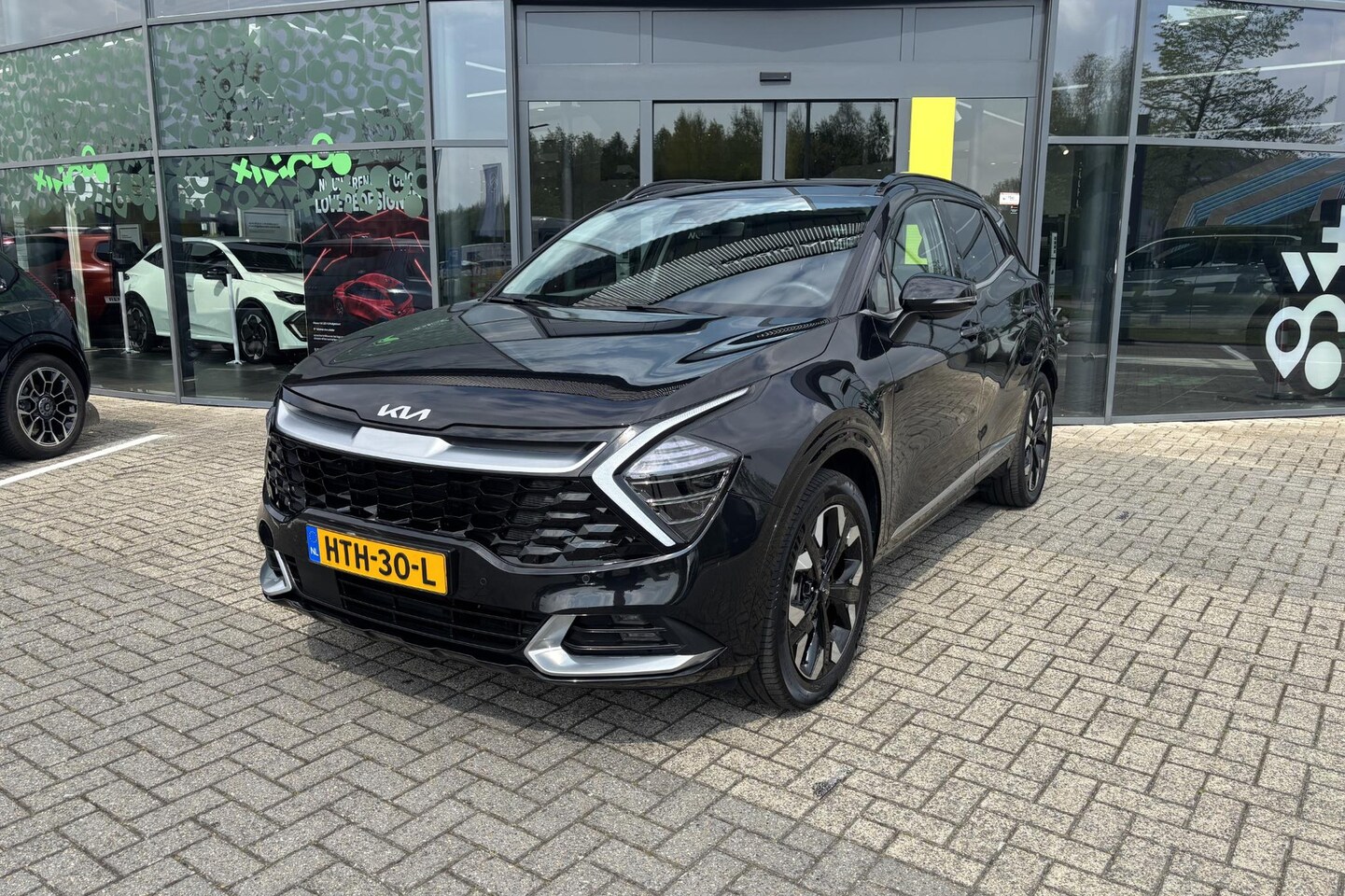 Kia Sportage - 1.6 T-GDi Plug-in Hybrid AWD DynamicPlusLine | Open Dak | Carplay | Navigatie | 19" velgen - AutoWereld.nl