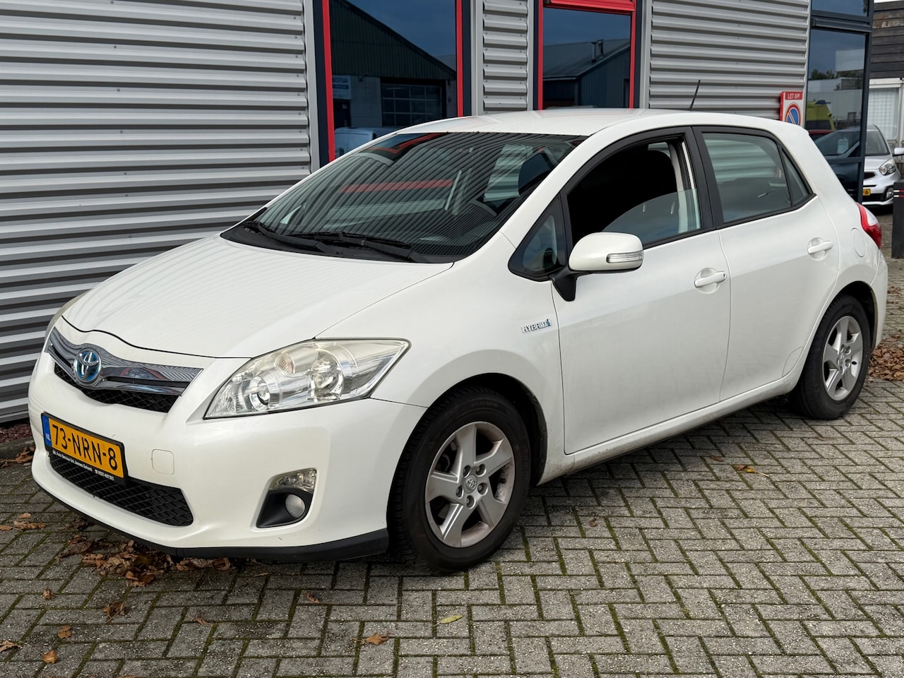 Toyota Auris - 1.8 Full Hybrid Aspiration Parelmoer wit - AutoWereld.nl
