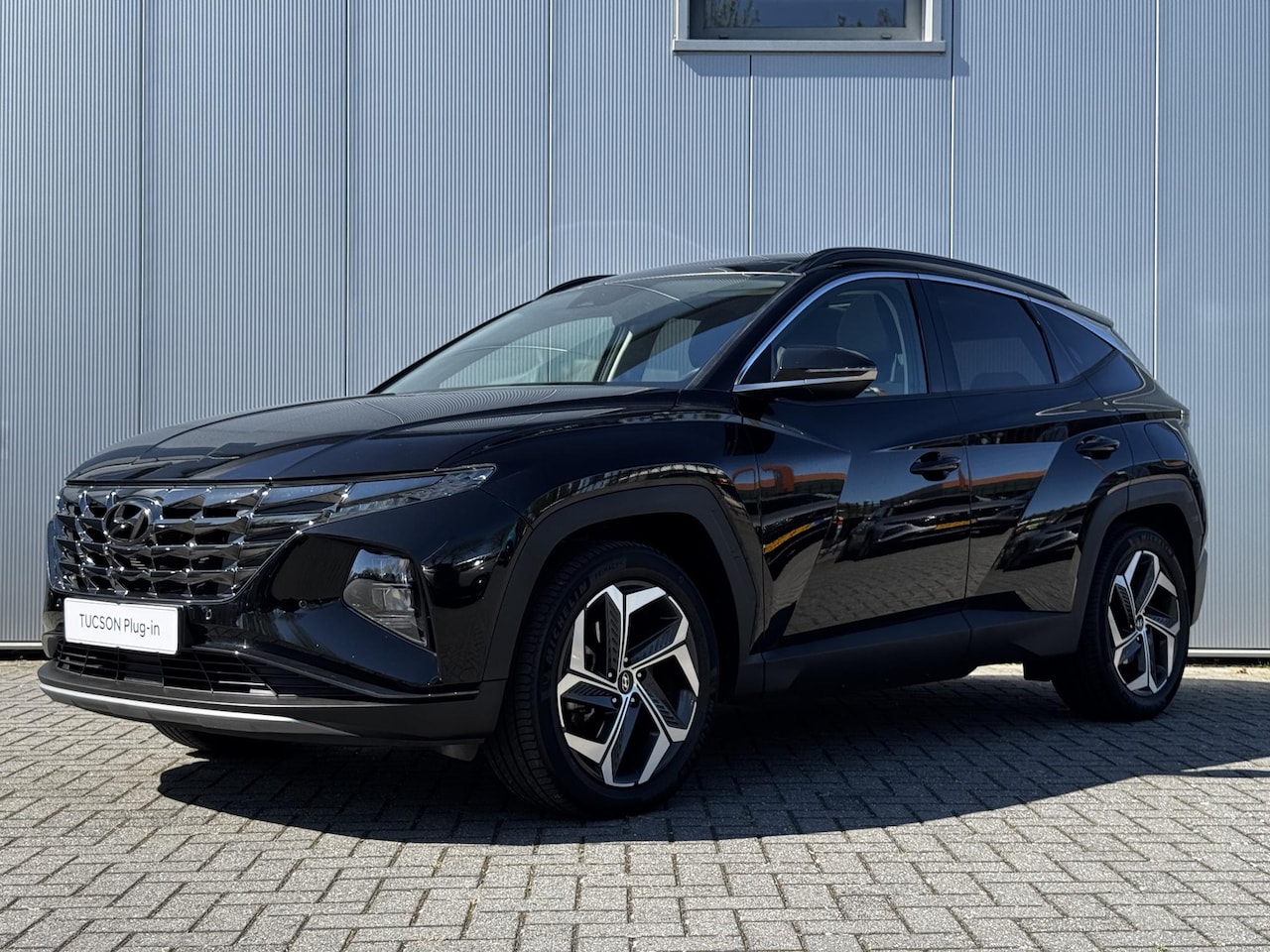 Hyundai Tucson - 1.6 T-GDI PHEV Comfort Smart 4WD / Pano Dak / 19" LM / Stoelverwarming / - AutoWereld.nl