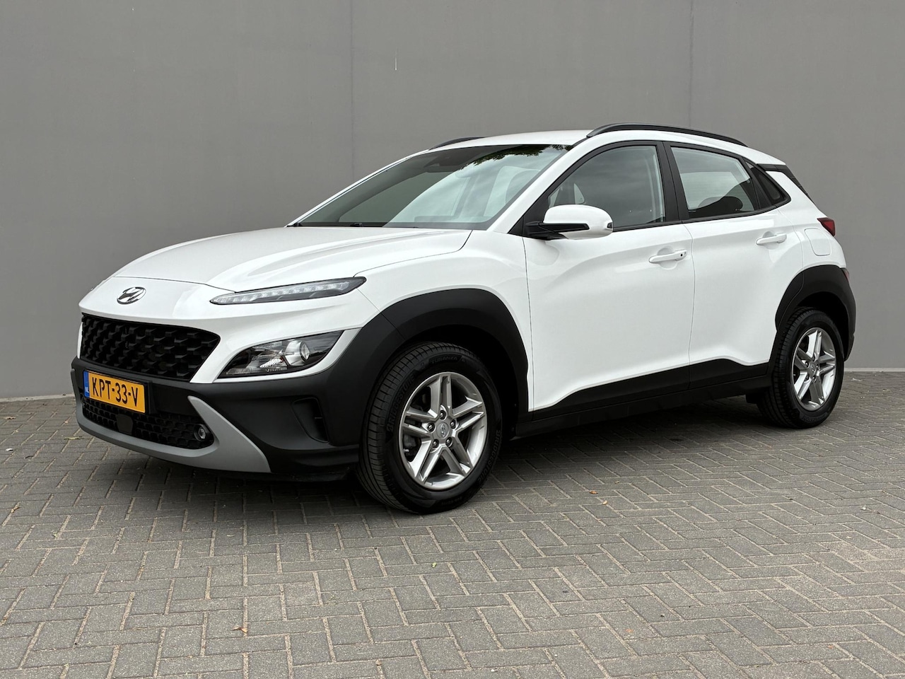 Hyundai Kona - 1.0 T-GDI Comfort / Navigatie d.m.v. Apple carplay/Android auto / Achteruitrijcamera / Cru - AutoWereld.nl
