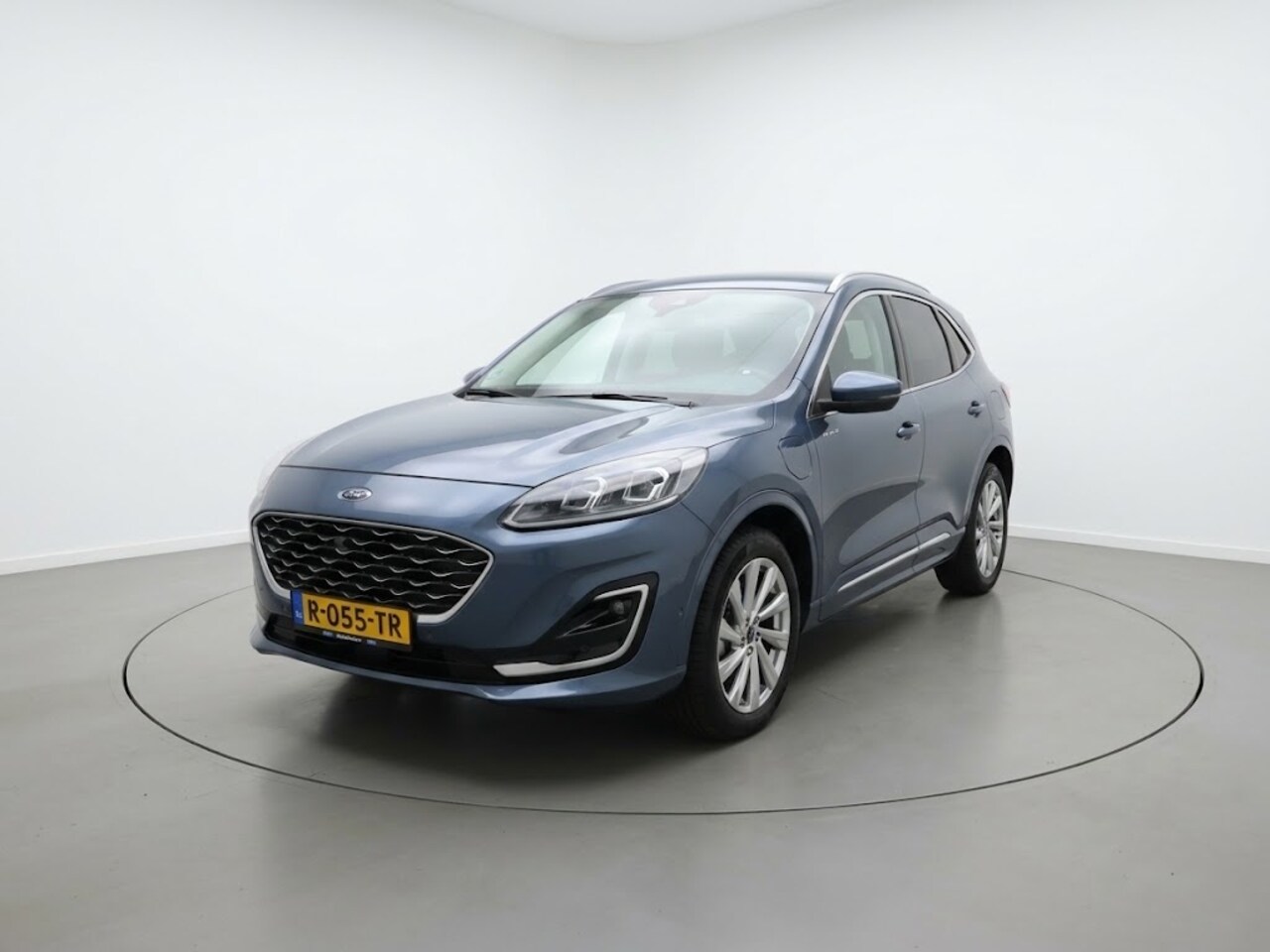 Ford Kuga - 2.5 PHEV Vignale | Geen import | Trekhaak | Lederen bekleding - AutoWereld.nl