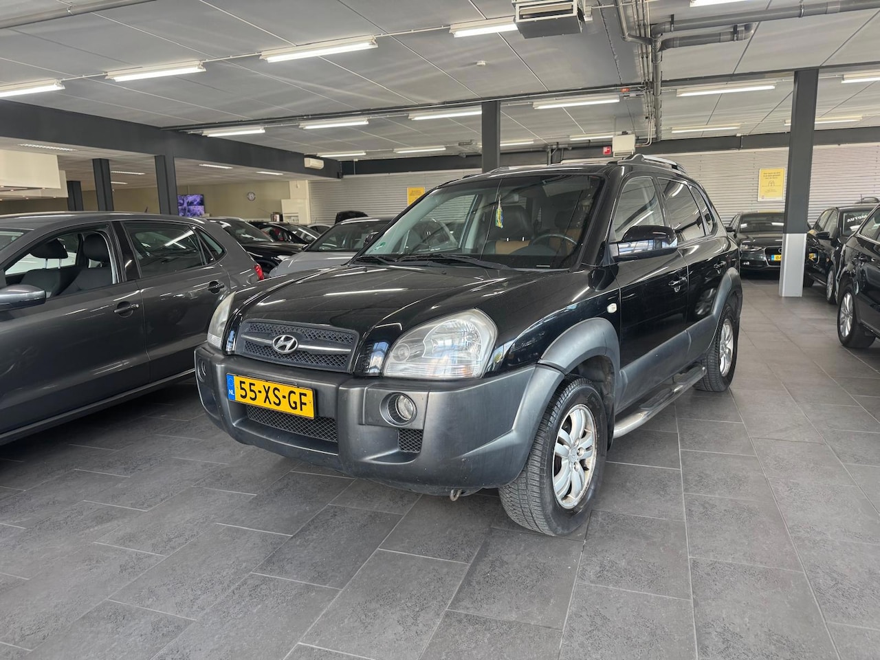 Hyundai Tucson - 2.0i Style Premium LPG g3 leer clima cruise controle lm-velgen elektrische pakket zijbar t - AutoWereld.nl