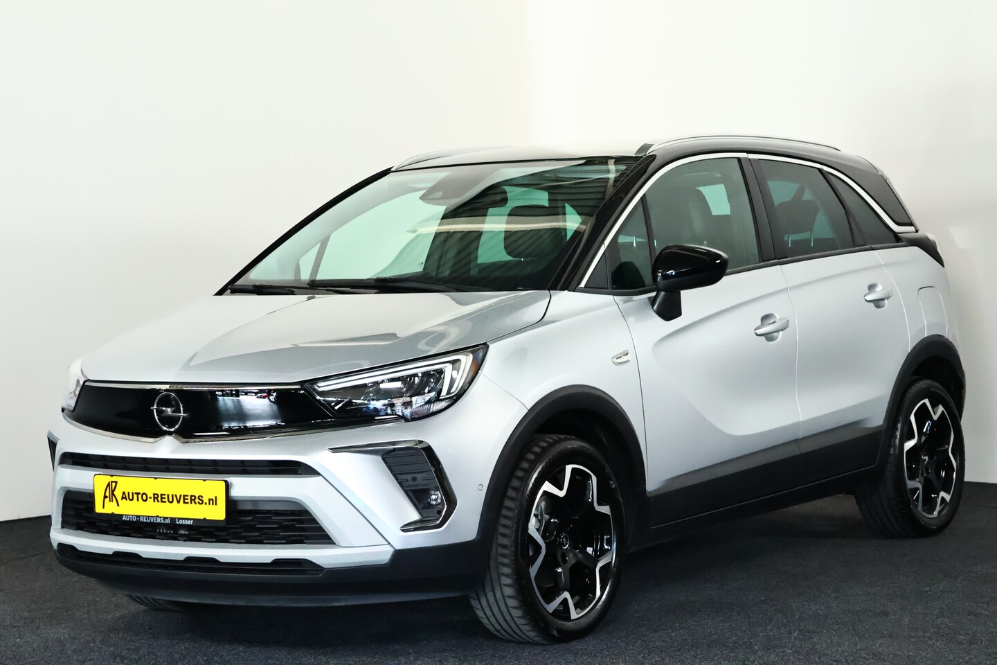 Opel Crossland - 1.2 Turbo Ultimate / LED / Navi / CarPlay / Leder / Cam - AutoWereld.nl