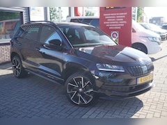 Skoda Karoq - 1.5 TSI ACT Sportline Business / Stoel en stuurverwarming / Cruise / Carplay / Camera