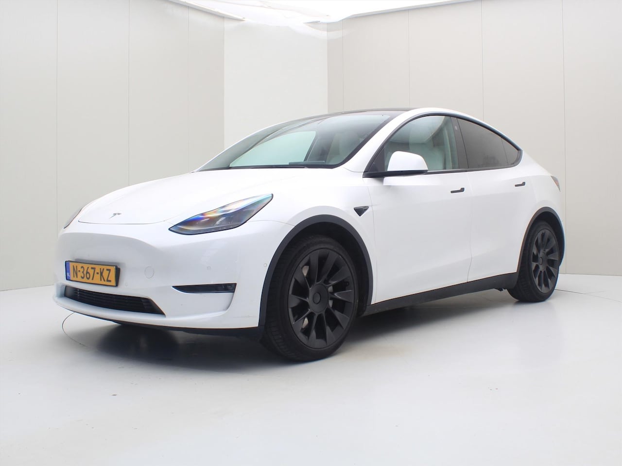 Tesla Model Y - Long Range 351pk AWD [ FSD+WIT LEDER+TREKHAAK+20 INCH+PREMIUM AUDIO ] - AutoWereld.nl
