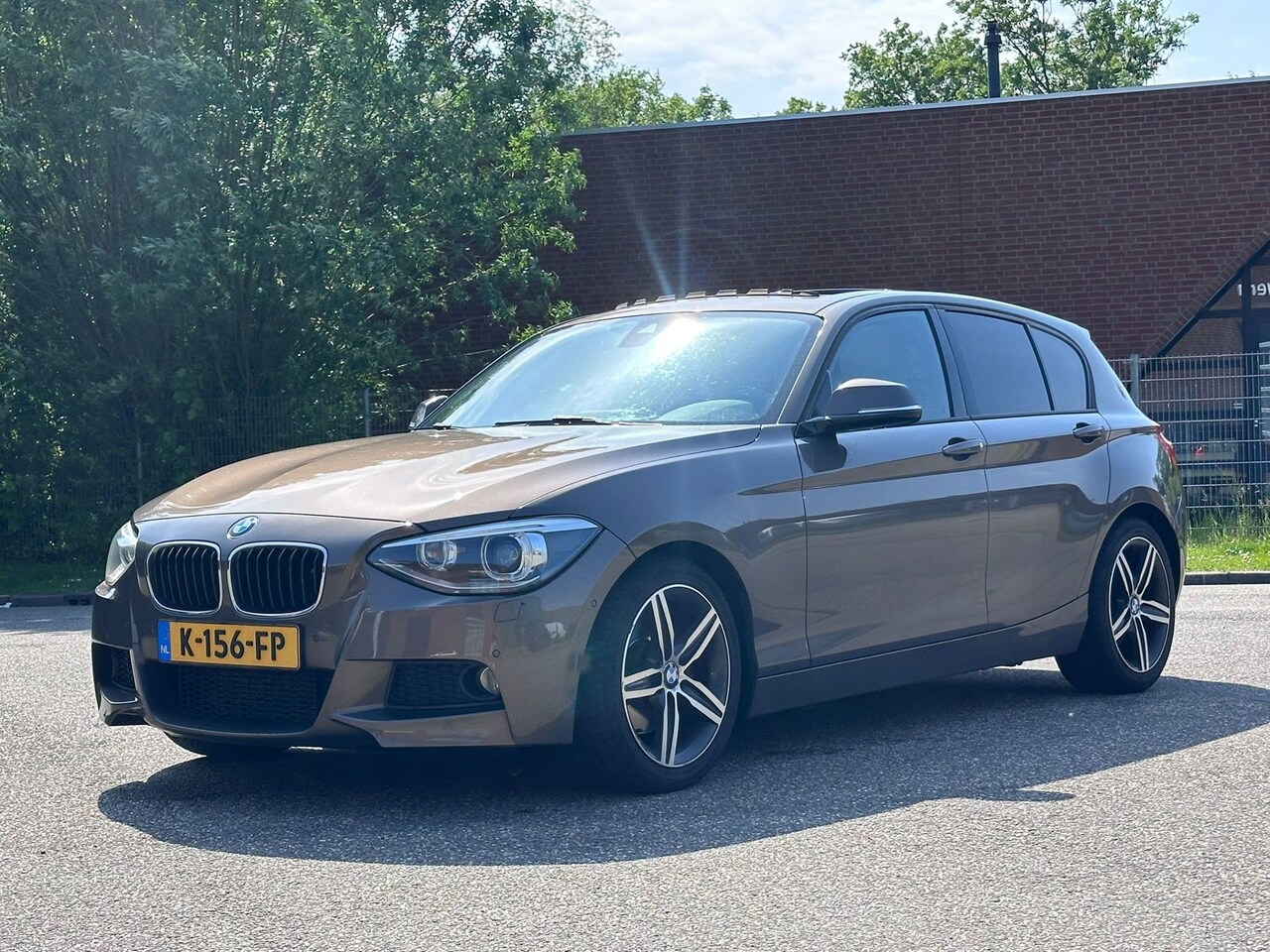 BMW 1-serie - 125i Business+ Automaat*Elektrische schuifdak*Dealer onderhouden*Navigatie*Cruise*Airco*LM - AutoWereld.nl