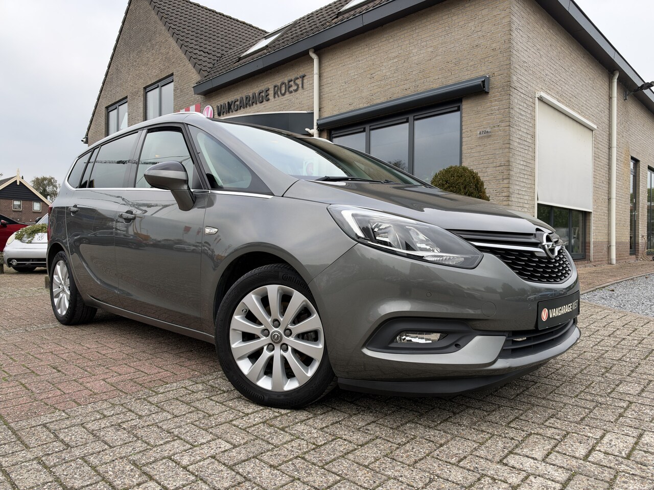 Opel Zafira Tourer - 1.4 Turbo Edition 7-Persoons Camera / Parkeersensors / Navigatie - AutoWereld.nl