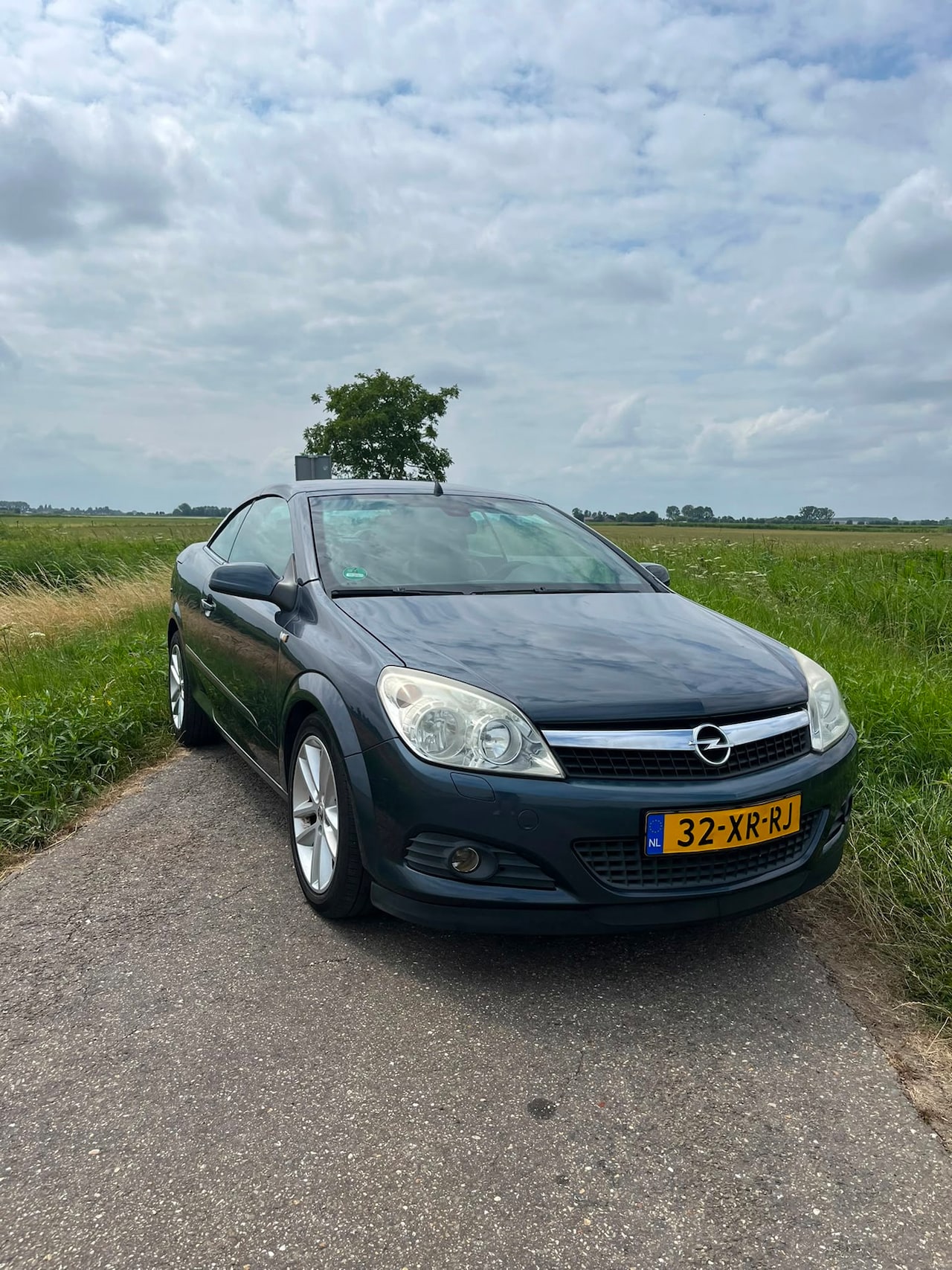 Opel Astra TwinTop - 1.6 Temptation trekhaak / airco / bruin leer / licht metalen wielen!! - AutoWereld.nl
