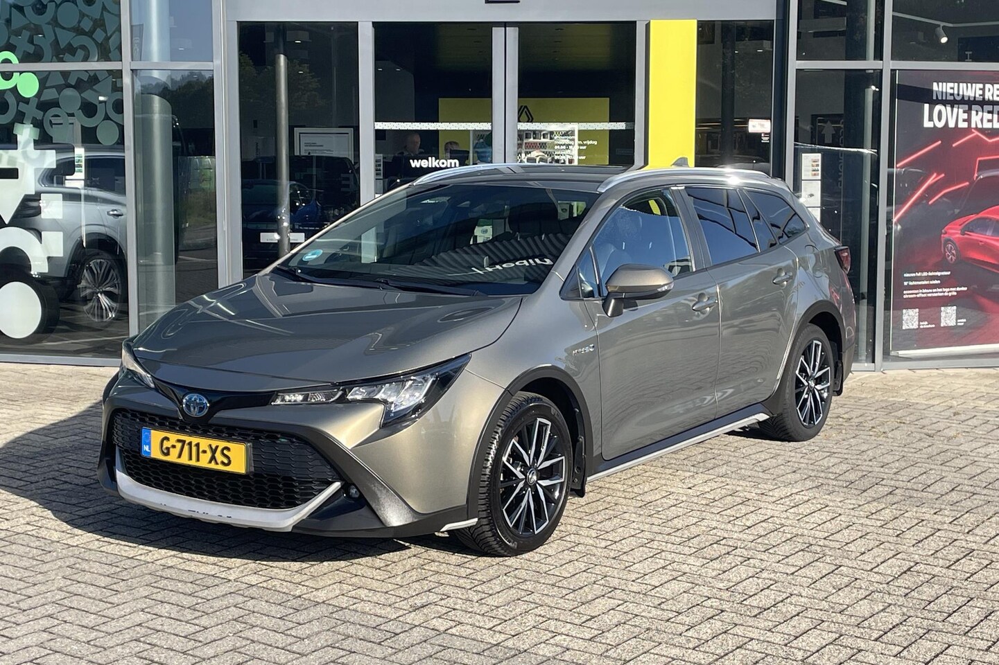 Toyota Corolla Touring Sports - 1.8 Hybrid Trek NL auto | dealer onderhouden bij Toyota | Navigatie | Climate Control | La - AutoWereld.nl