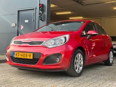 Kia Rio - 1.2 CVVT Comfort Pack / 5-DRS / AIRCO / AUX / ISOFIX / RESERVEBAND / TREKHAAK / ALL-SEASON