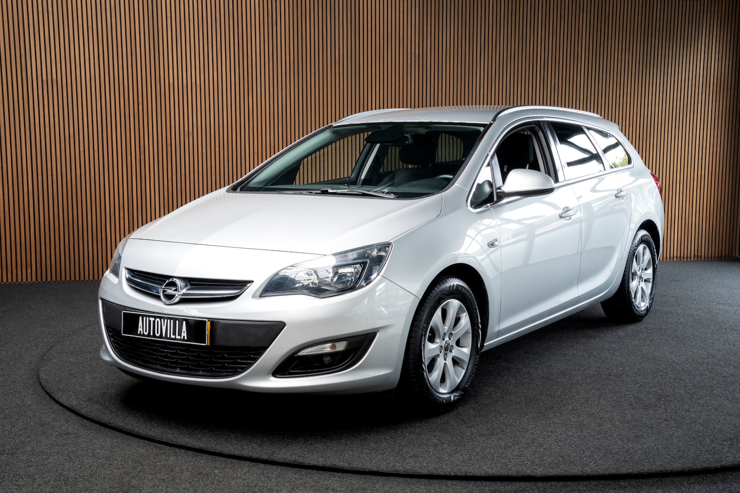 Opel Astra Sports Tourer - 1.4 Turbo 120pk Navi Climate Cruise PDC AGR Sportstoelen LM velgen - AutoWereld.nl