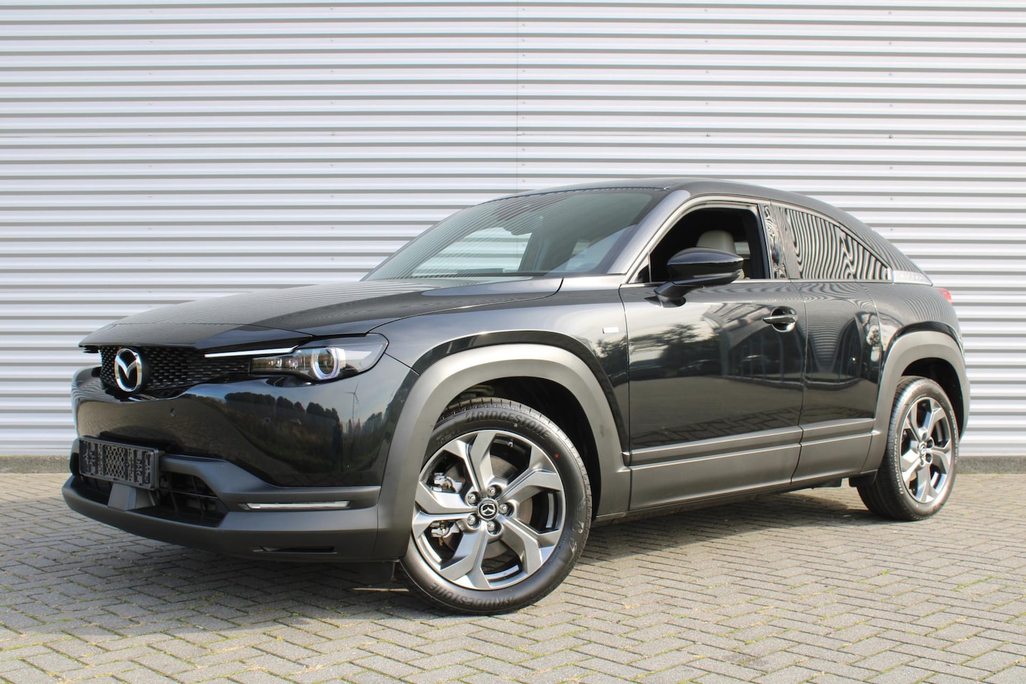 Mazda MX-30 - e-SkyActiv EV 145PK Advantage Modern 36 kWh | Stoelverwarming | HUD | Dodehoek detectie | - AutoWereld.nl