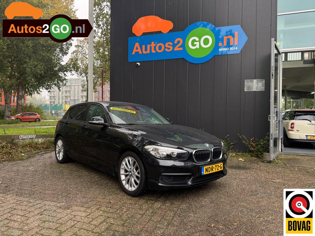 BMW 1-serie - 118i Corporate Lease I Automaat I leder I parkeersensoren I Navi I leder I rijklaar I - AutoWereld.nl