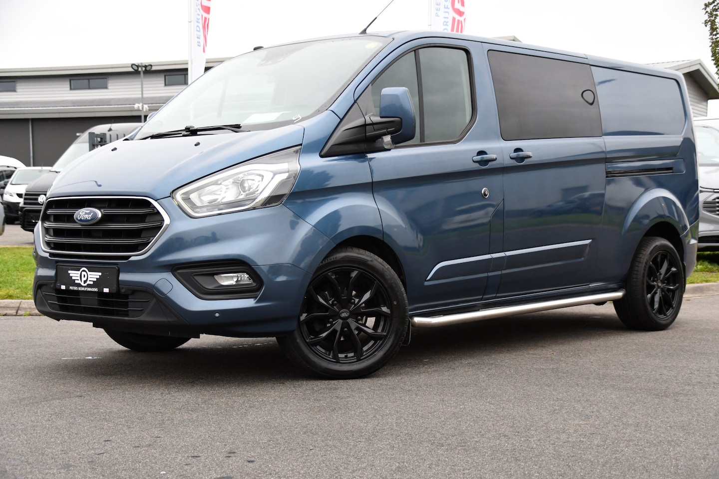 Ford Transit Custom - 300 2.0 TDCI L2H1 Limited DC Adaptieve Cruise, Camera, Cruise, 2 x Schuifdeur, 130pk, Auto - AutoWereld.nl