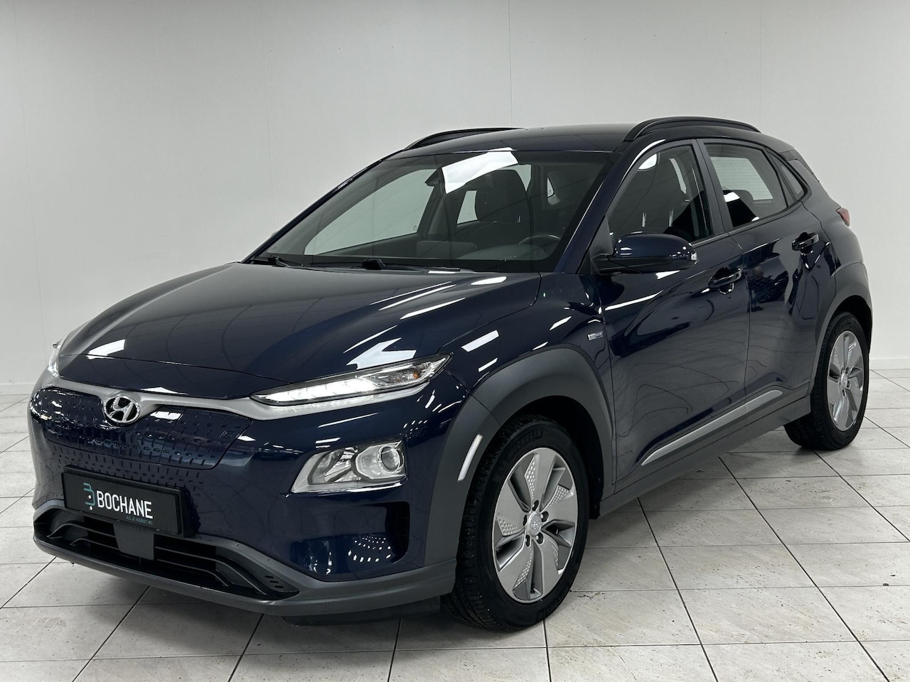 Hyundai Kona Electric - EV Comfort 64 kWh NAVIGATIE | ACHTERUITRIJCAMERA | PARKEERSENSOREN - AutoWereld.nl