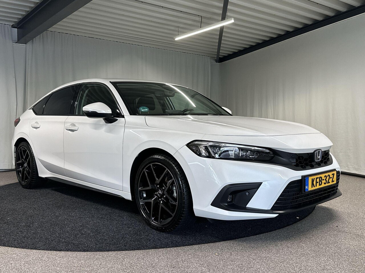 Honda Civic - 2.0 e:HEV Advance Automaat | Leder | Pano - AutoWereld.nl
