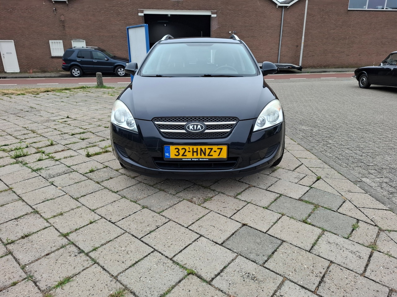 Kia Cee'd Sporty Wagon - 1.4 Fifteen 1.4 Fifteen - AutoWereld.nl