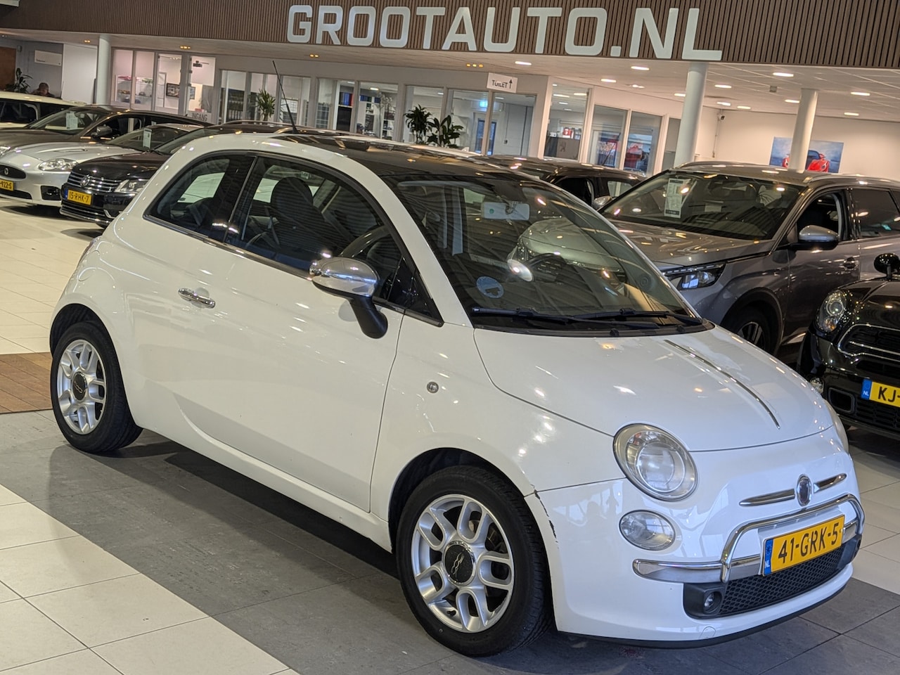 Fiat 500 - 1.2 Lounge Panoramadak, Airco, Trekhaak, Stuurbekrachtiging - AutoWereld.nl