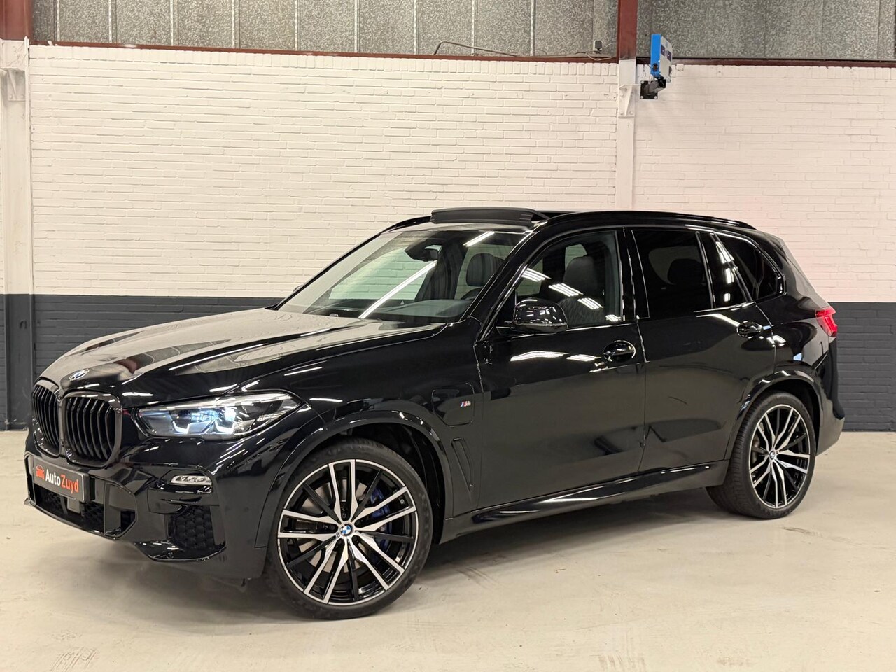 BMW X5 - XDrive45e High Executive M-Sport Navi / Pano / Harman Kardon/ Ad. Cruise / DAB - AutoWereld.nl