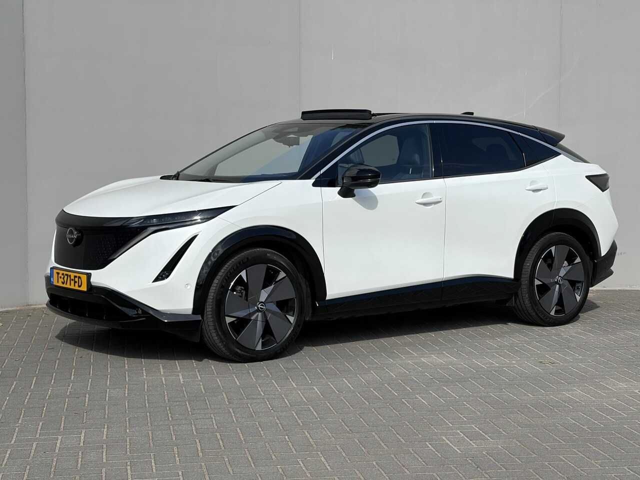 Nissan Ariya - Evolve 91 kWh / SOH 99% / Stoelverwarming voor en achter / Schuif-kantel dak / Stoelventil - AutoWereld.nl