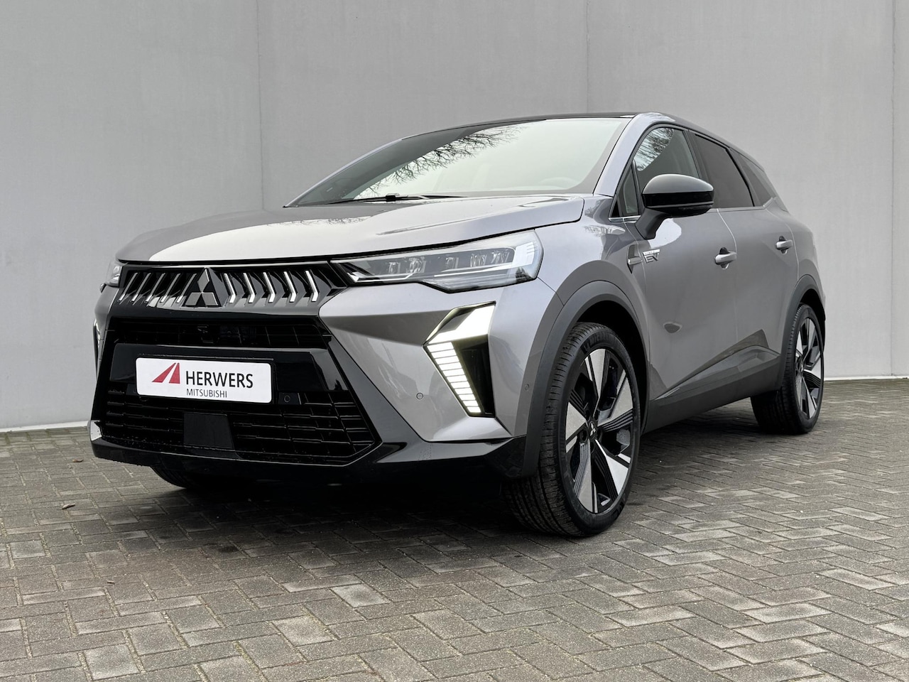 Mitsubishi Grandis - 1.8 HEV Instyle / 8 jaar fabrieksgarantie / Elektrochromatisch glazen panoramadak / Google - AutoWereld.nl