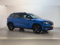 Skoda Karoq - 1.5 TSI 150pk ACT Sportline Business Camera Trekhaak Sfeerverlichting Stoelverwarming Adap