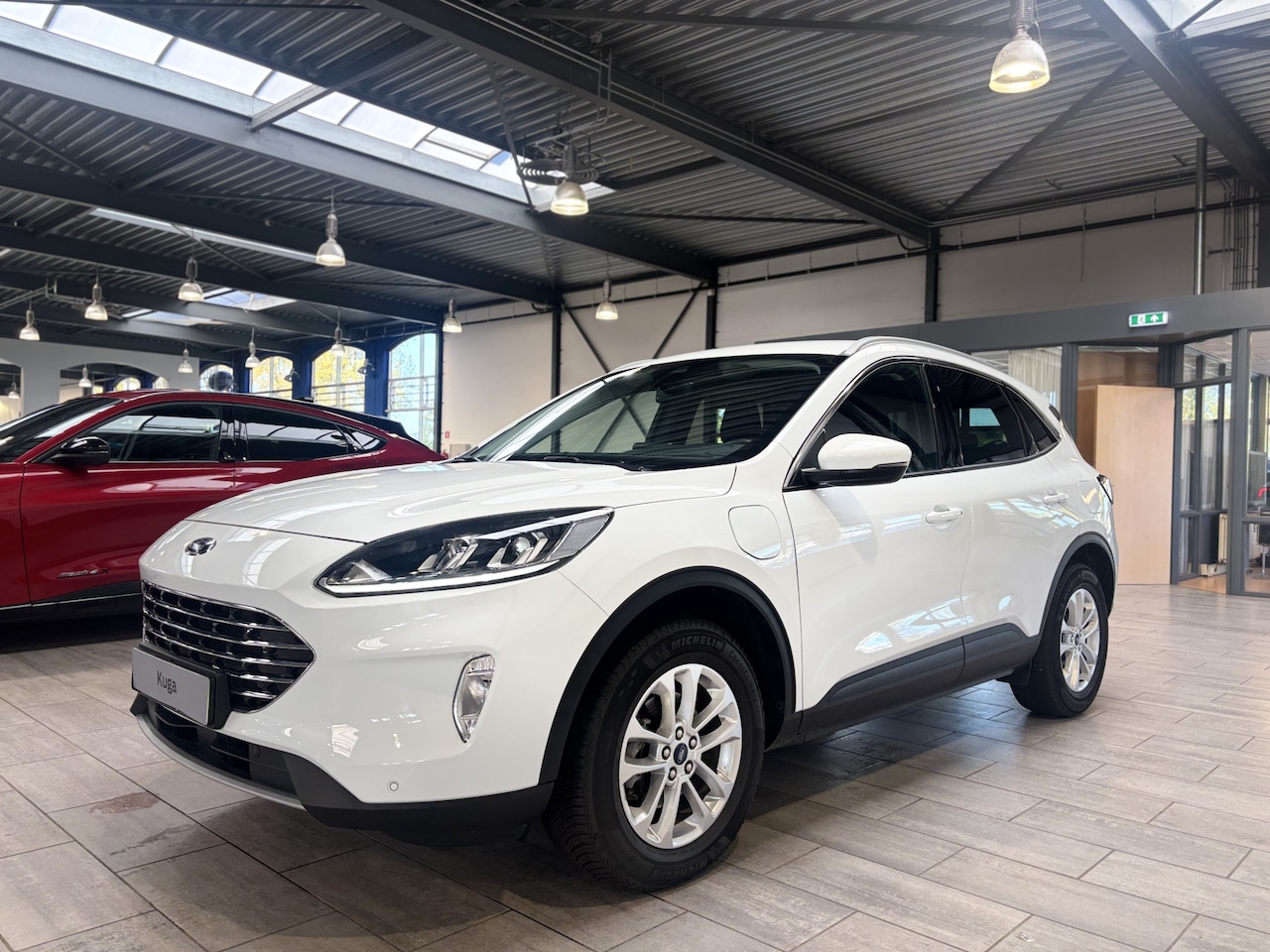 Ford Kuga - 2.5 PHEV 225 pk Titanium | Trekhaak | Winter Pack | El. a. klep | Camera | 100% dealer ond - AutoWereld.nl
