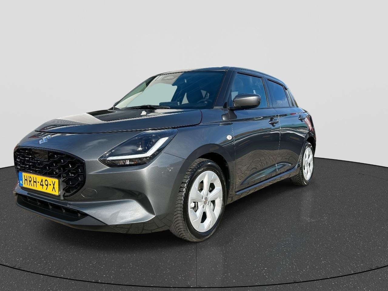 Suzuki Swift - 1.2 Select Smart Hybrid RIJKLAAR | Navigatie | Camera | Cruise Control Adaptief | All-Seas - AutoWereld.nl