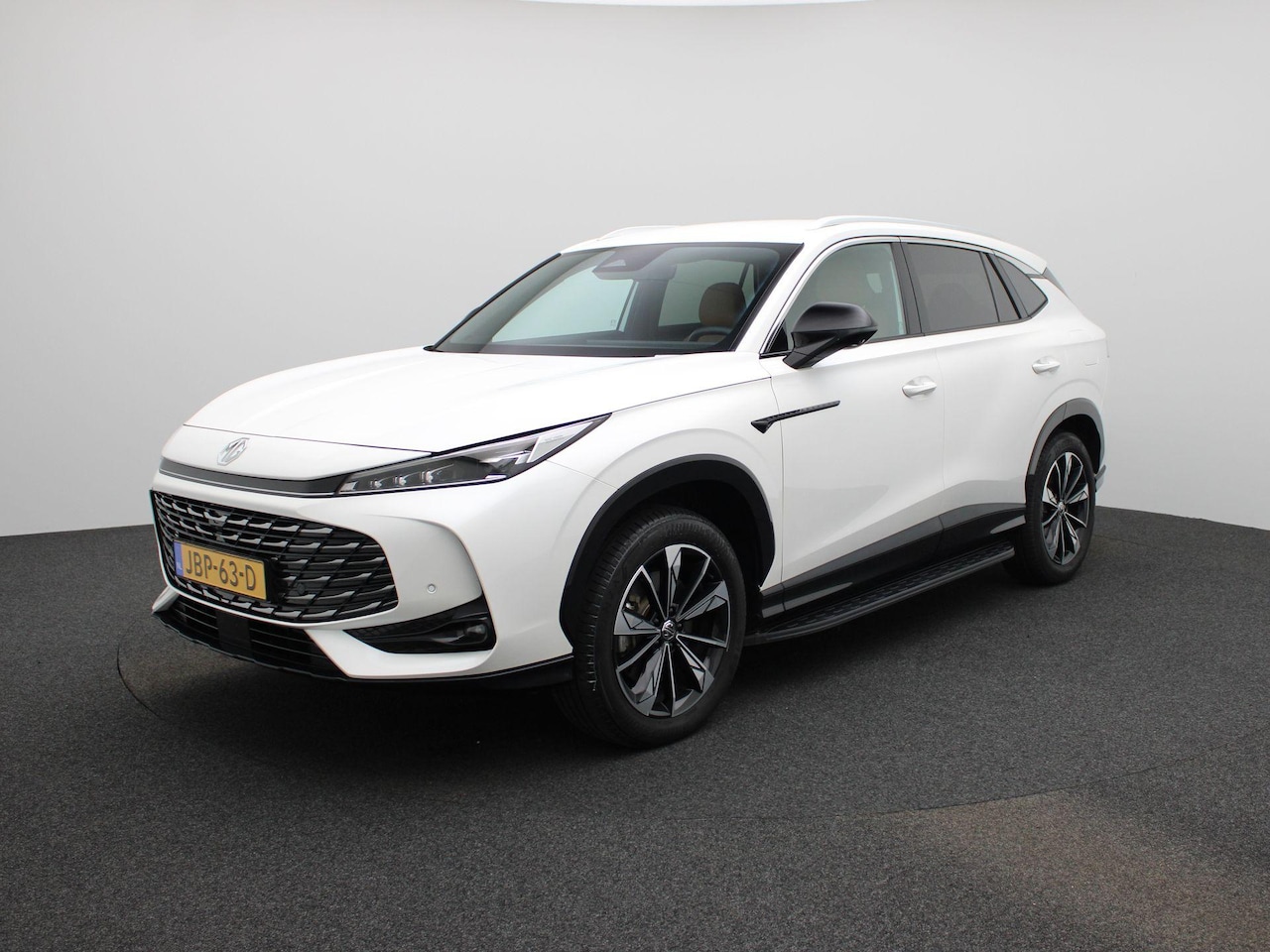 MG MG HS PHEV - 1.5 Aut. Luxury | 7 jaar fabrieksgarantie | Bruin Leder | 100km Elektrisch | Navi | CarPla - AutoWereld.nl