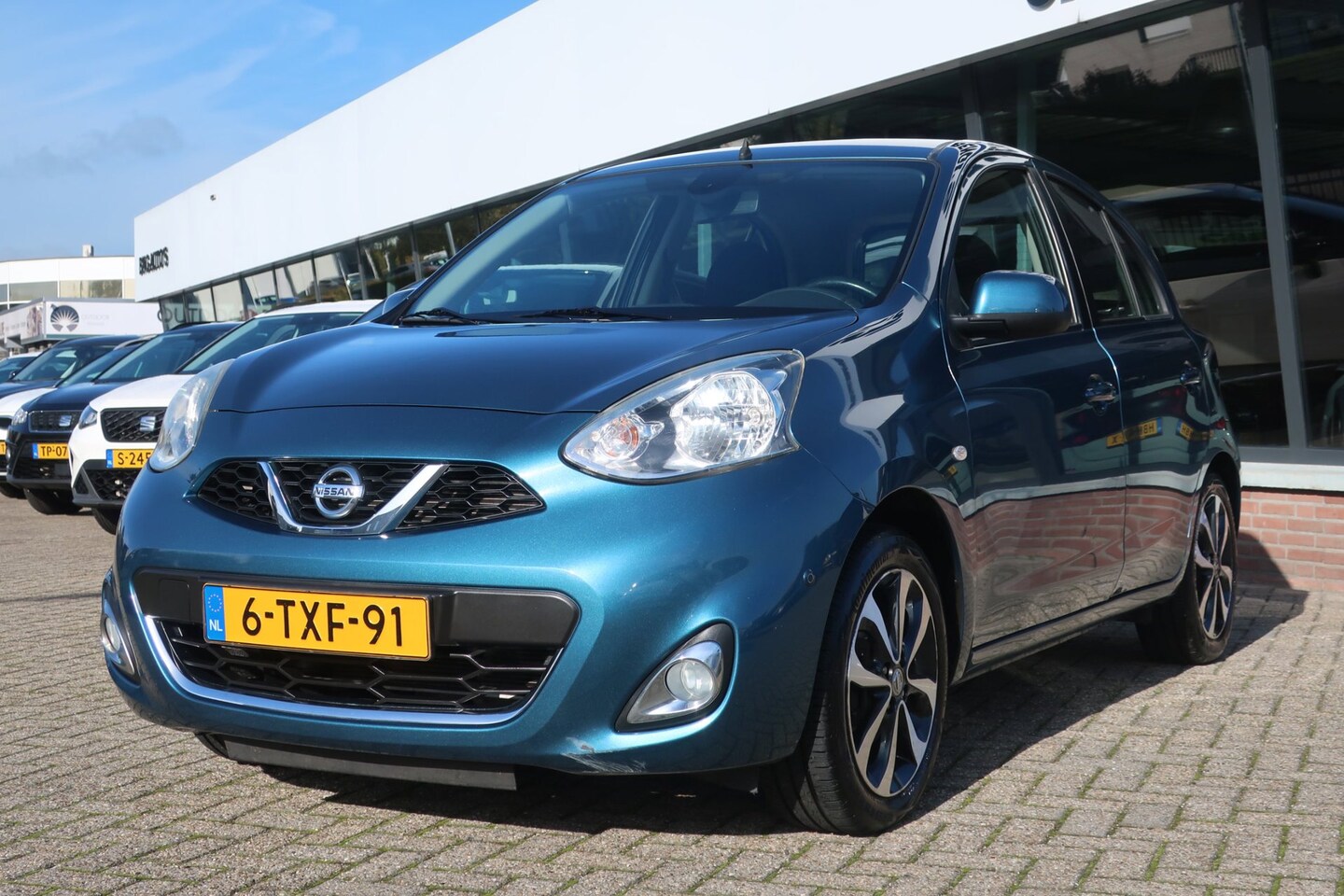 Nissan Micra - 1.2 DIG-S ELLE 2e EIG_NAVI_ECC_CRUIS_PDC V+A_LMV. - AutoWereld.nl