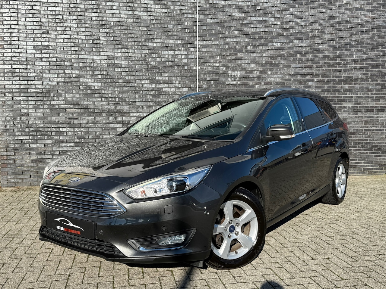 Ford Focus Wagon - 1.0 Titanium 125pk|Camera|Cruise|Carplay|SONY|360*PDC|Trekhaak mogelijk!|Keyless|Stoel&Stu - AutoWereld.nl