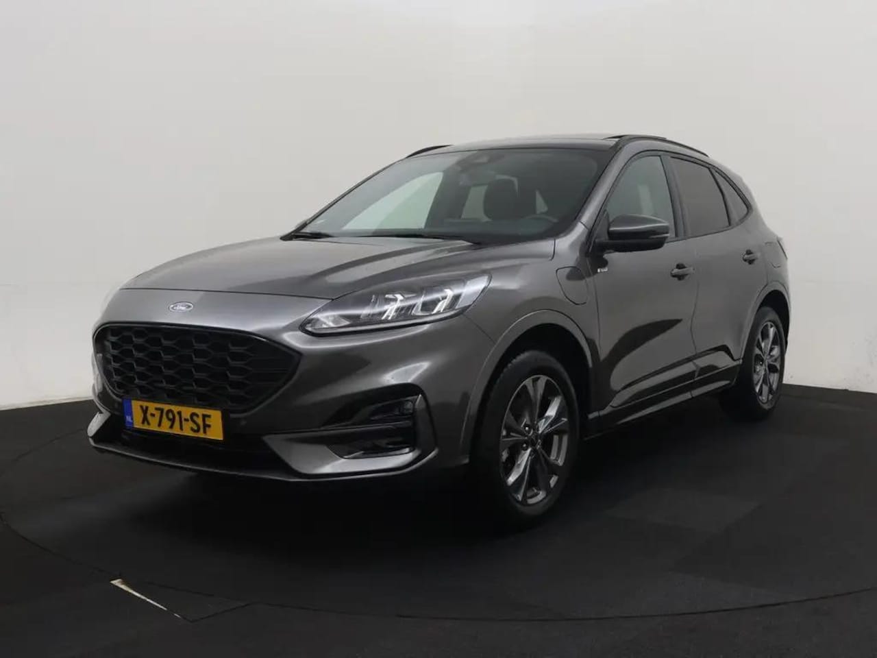 Ford Kuga - 2.5 PHEV ST-Line Panoramadak Trekhaak Camera Privacy Glass Dealeronderhouden - AutoWereld.nl