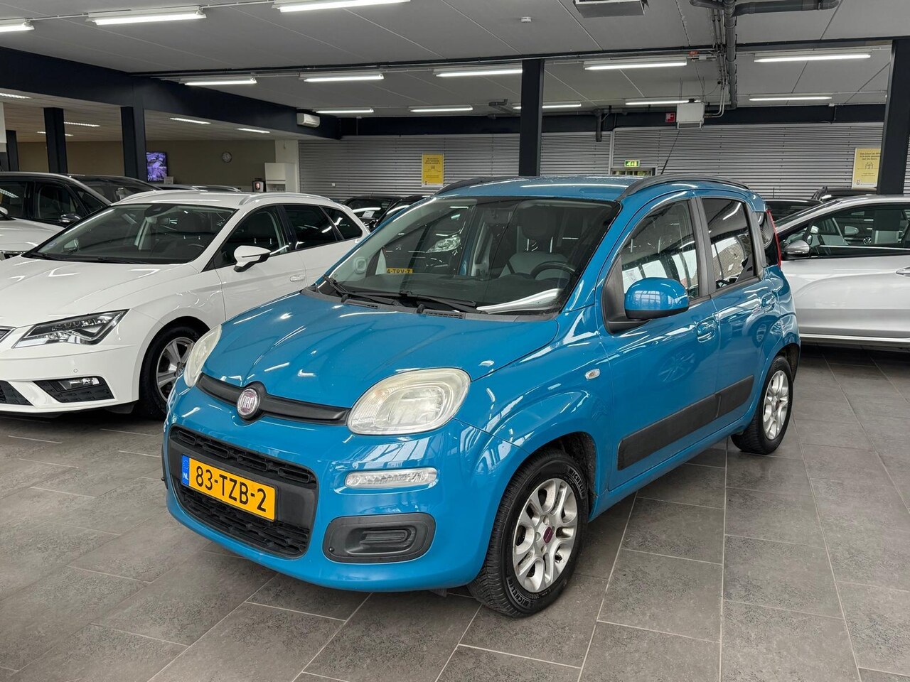 Fiat Panda - 0.9 TwinAir Lounge airco cruise controle lm-velgen elektrische pakket trekhaak - AutoWereld.nl