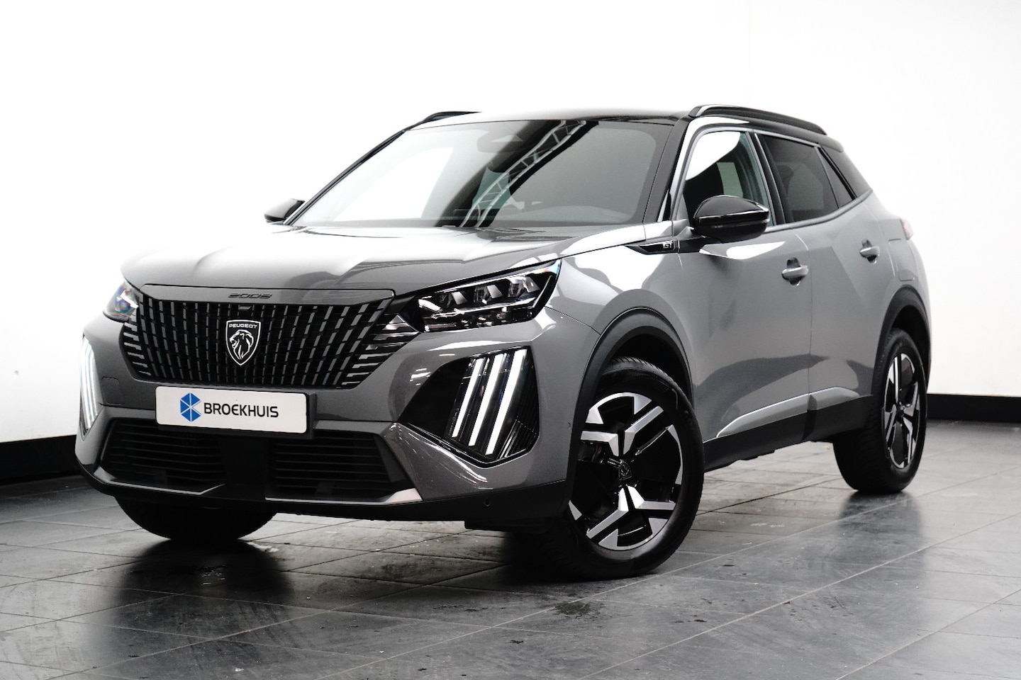 Peugeot 2008 - 1.2 Hybrid 145 GT Rondomzicht Camera | Navigatie | Carplay | Leder/Stof | Adaptieve Cruise - AutoWereld.nl