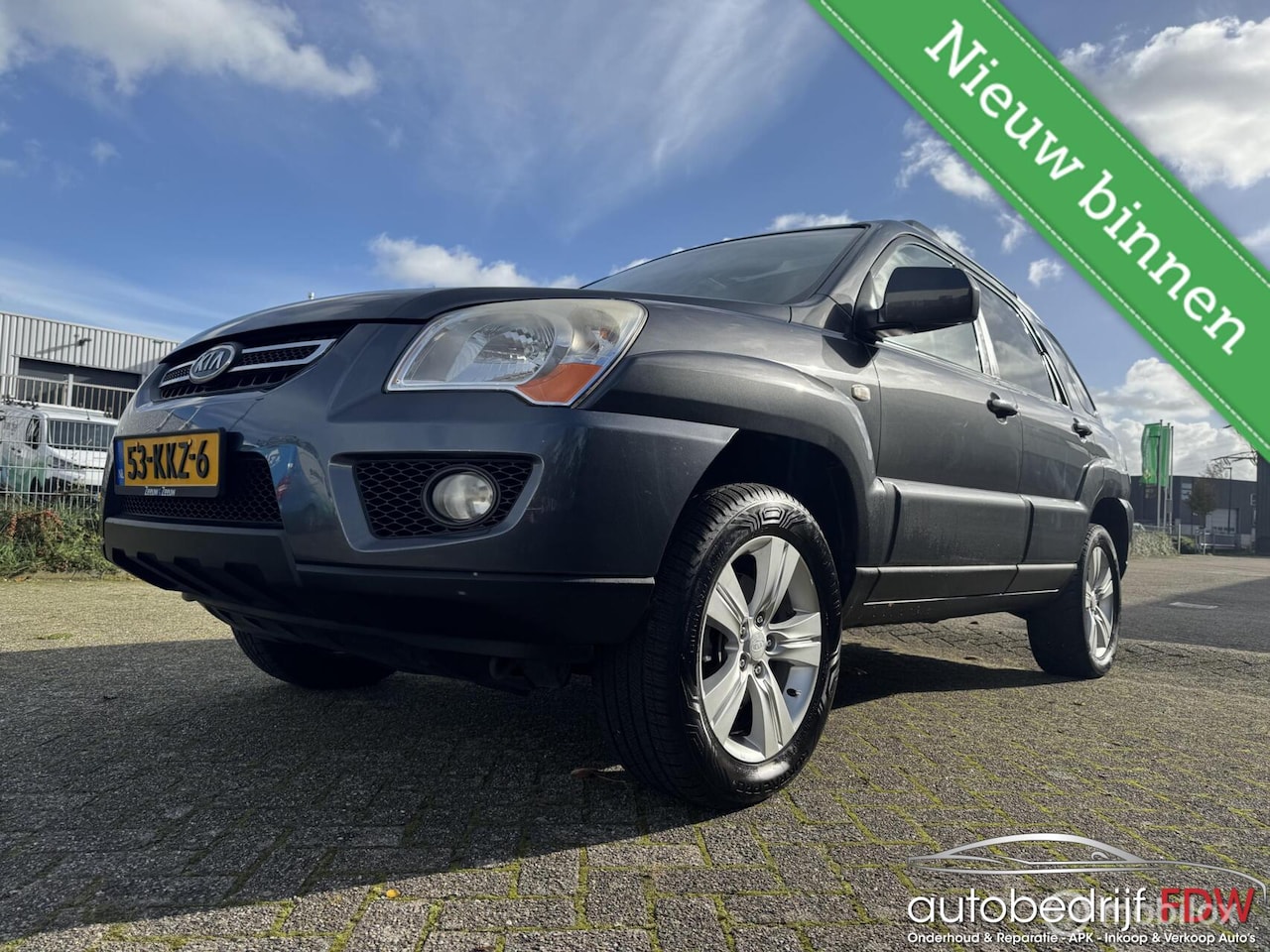 Kia Sportage - 2.0 CVVT/AIRCO/TREKHAAK/LEER/PANO-DAK/NAP/PDC/ - AutoWereld.nl