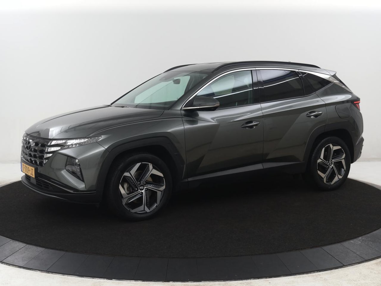 Hyundai Tucson - 1.6 T-GDI HEV Premium | Leder | Memory | Trekhaak | Adaptive cruise | Stuur/stoelverwarmin - AutoWereld.nl
